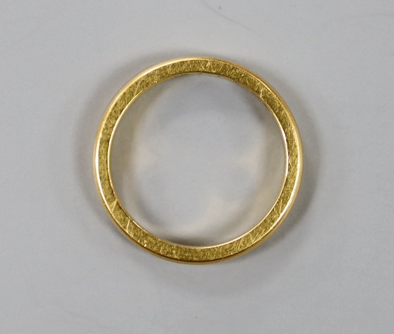 A 22ct gold wedding band, size J, 4.3 grams.